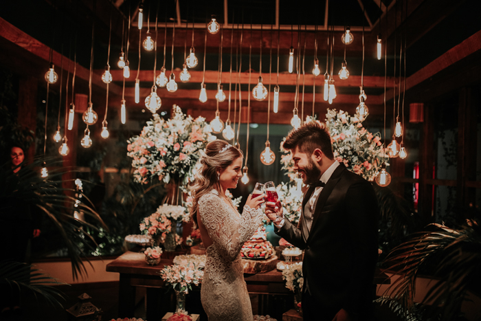 Casamento iluminado à noite &#8211; Carol e Flavio