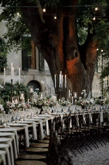 mesa de convidados com velas para casamento vintage