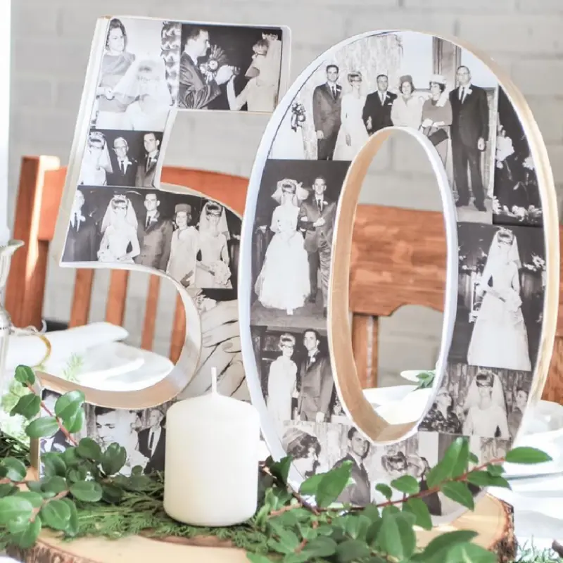 decoração de mesa com número 50 com fotos coladas