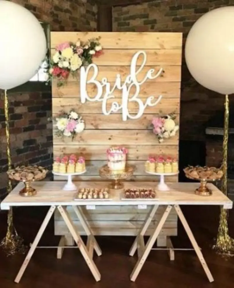 decoração chá de panela rústico com backdrop