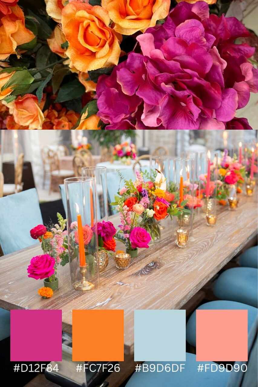 Mesa de casamento com decoração tropical, arranjos florais em tons de rosa e laranja, velas em recipientes de vidro e uma paleta de cores vibrantes destacada por tons quentes