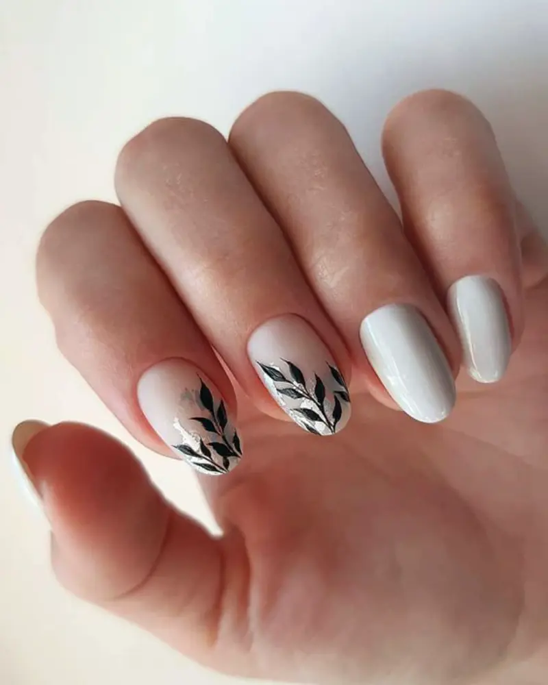 unhas em gel com um design floral botânico