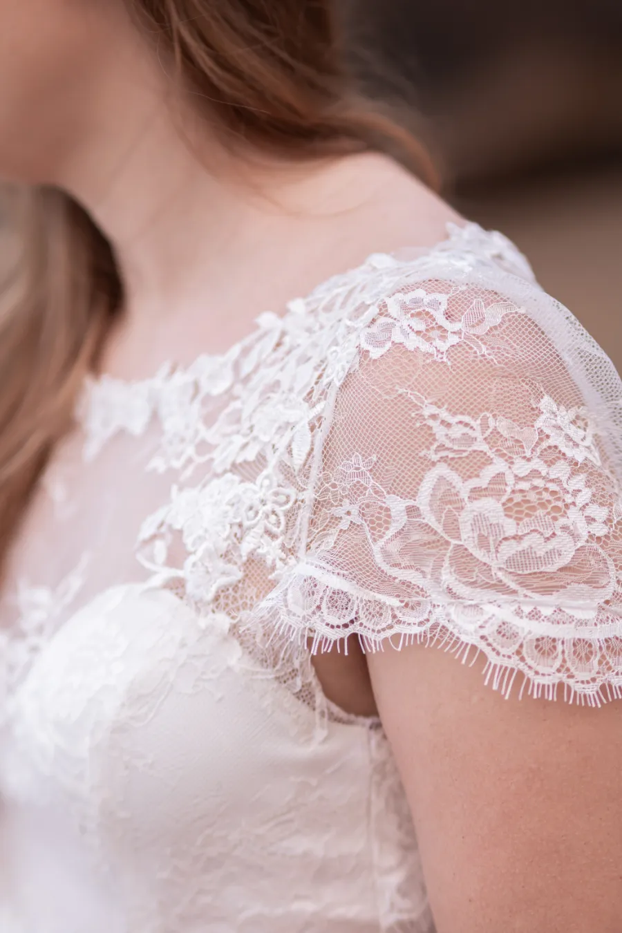 detalhe de vestido de noiva em renda