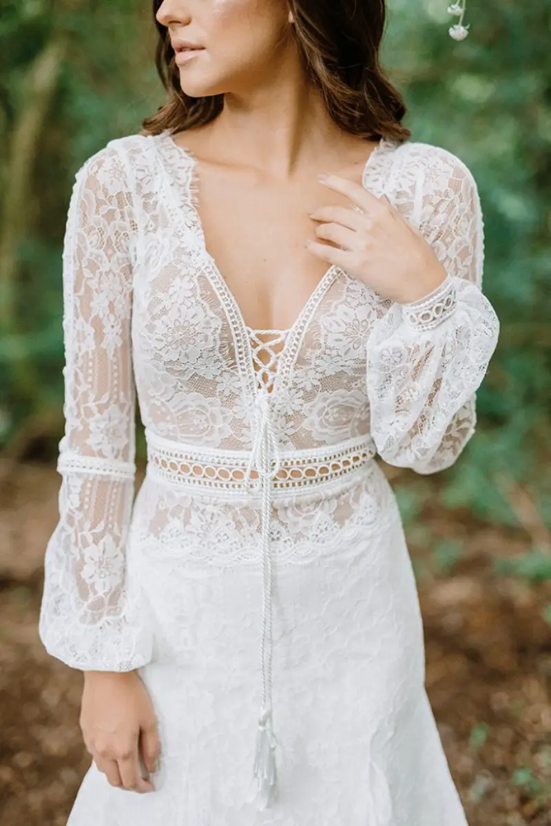 vestido de noiva rendado com manga longa