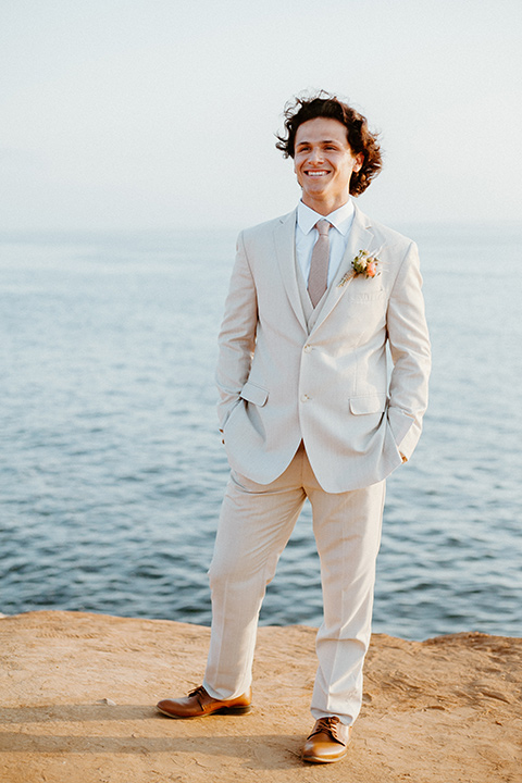  san-deigo-cliffs-groom-standinf-