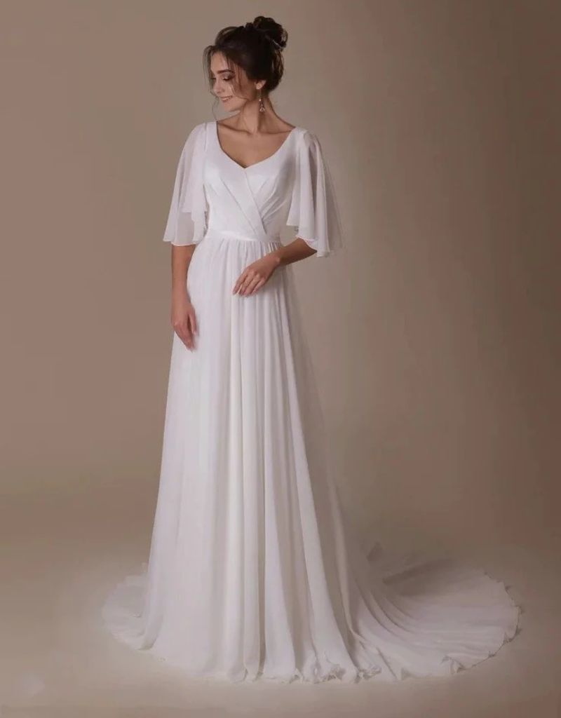 vestido evas&ecirc; com manga curta